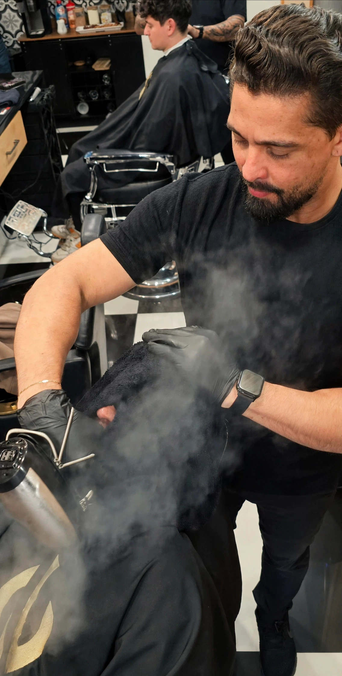 Barber with a hot towel